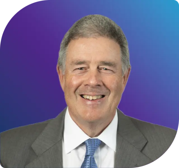 A professional headshot of Andrew Kemp