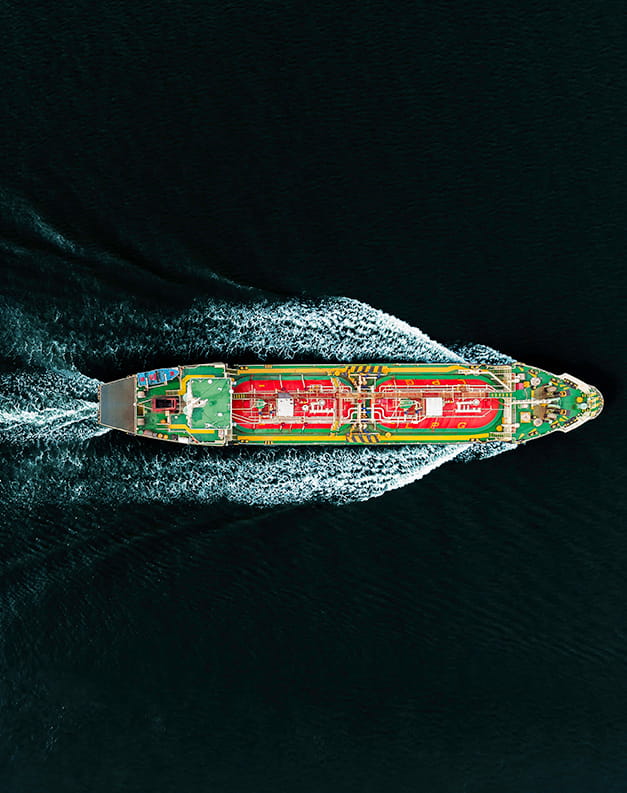 A container boat travelling through dark seas