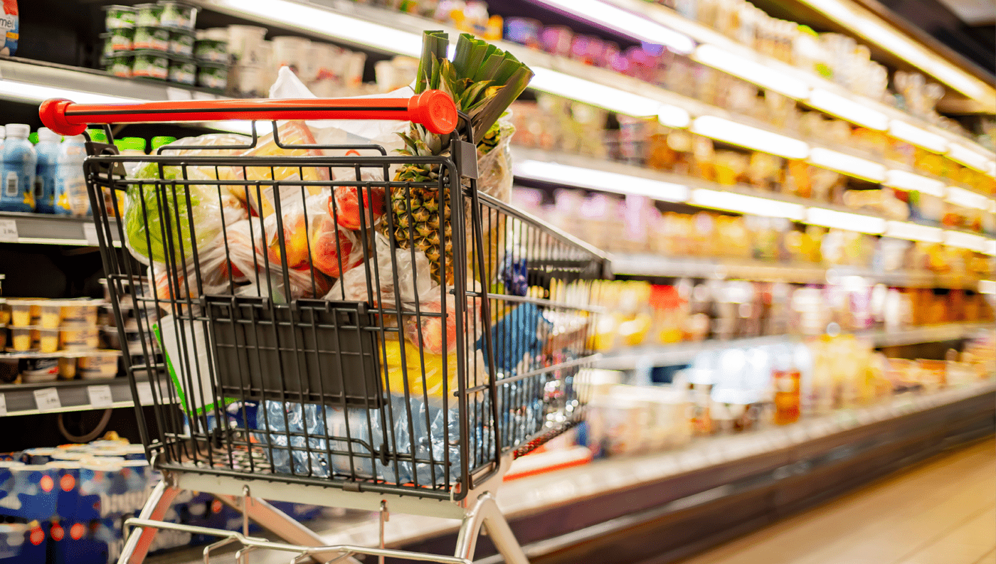 A trolley full of food in a supermarket