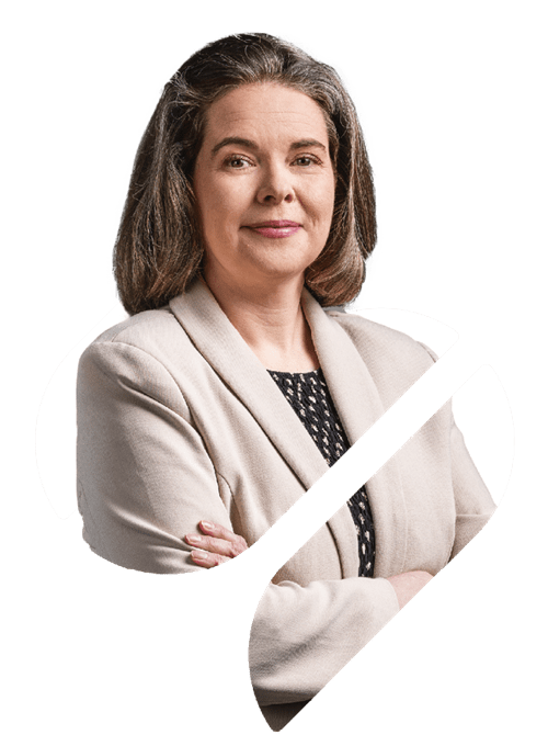 A professional portrait of Group Sustainability Director Dr Sarah Peers stood within the Spirax Group S shape. 