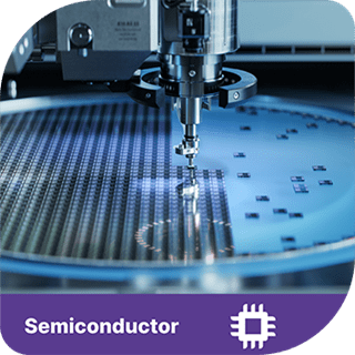 Semiconductor manufacturing in progress. A purple tab sits under the image with an icon and word next to it denoting semiconductor