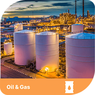 A picture of an oil refinery at night. There is an orange tab underneath that says 'oil and gas' with an oil drum icon next to it. 