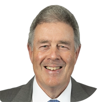 A professional portrait of Andrew Kemp